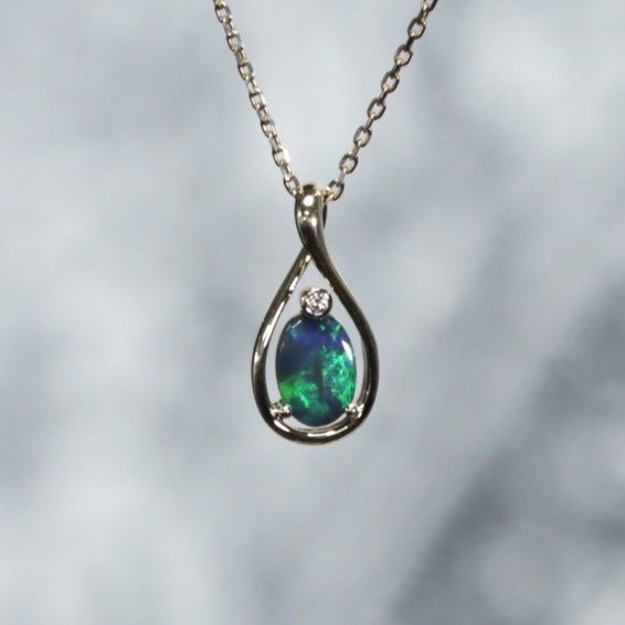 Black solid opal 18K Gold pendant 2016