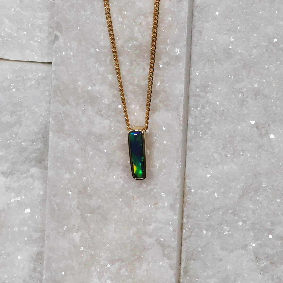 Black opal solid stone rolling green flash