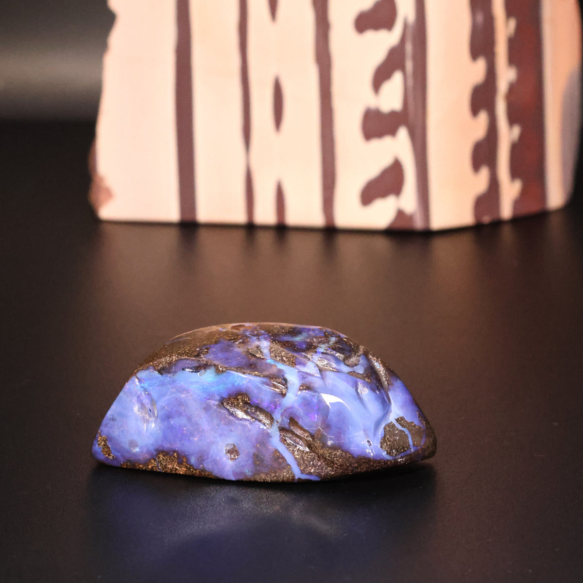Boulder opal specimen strong blue color 0.10 kg