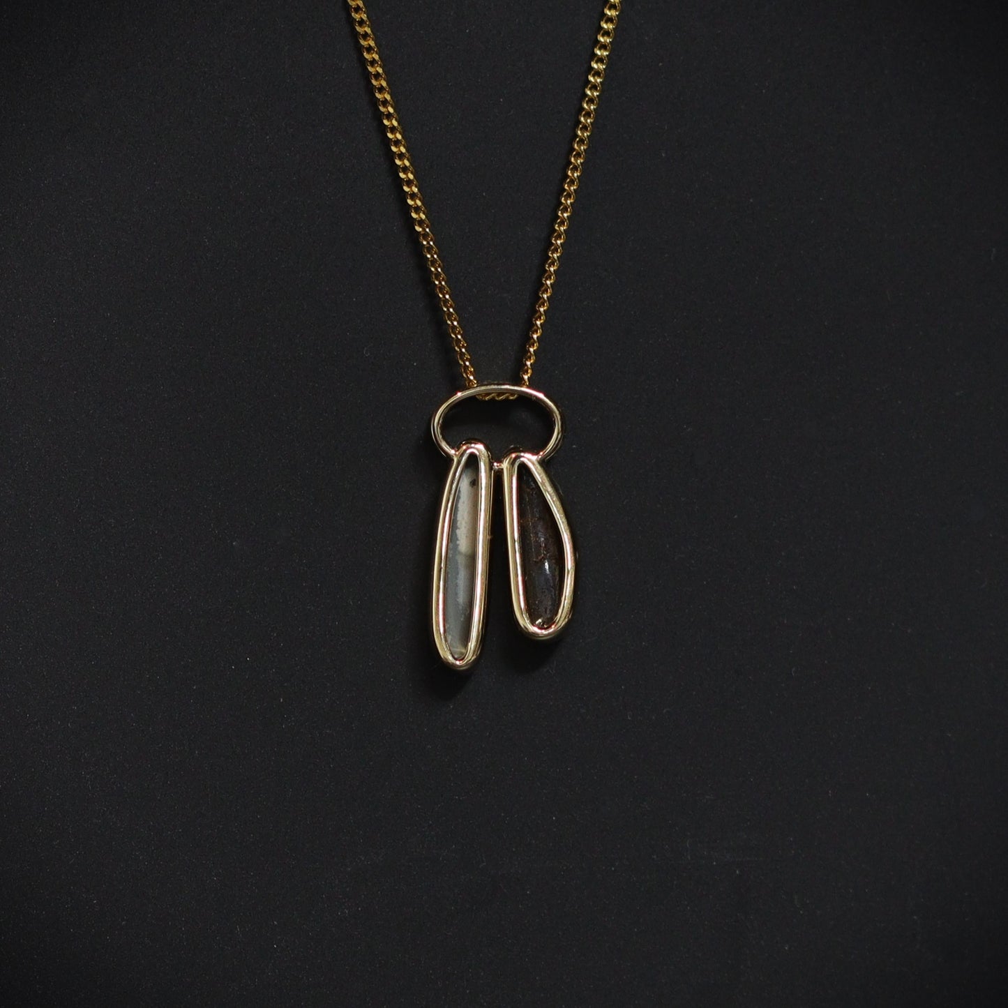 Australian Boulder and Black opal set in 18 K gold pendant