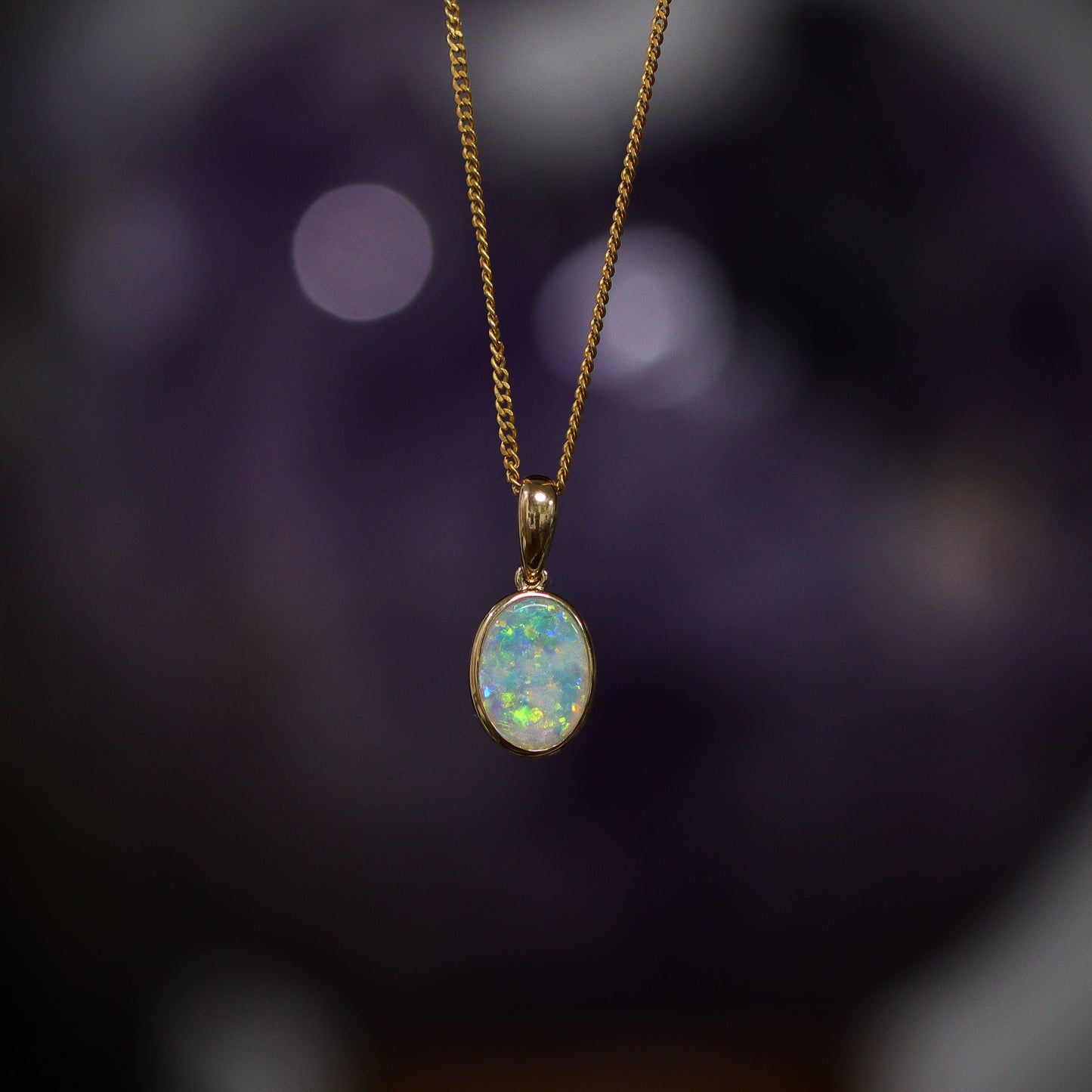 Australian Black Opal crystal 18 karat gold pendant
