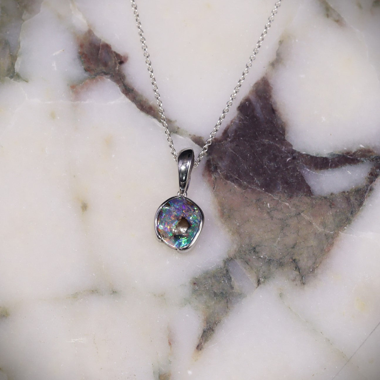 Australian boulder opal pendant in sterling silver — 3.47ct rare red and blue