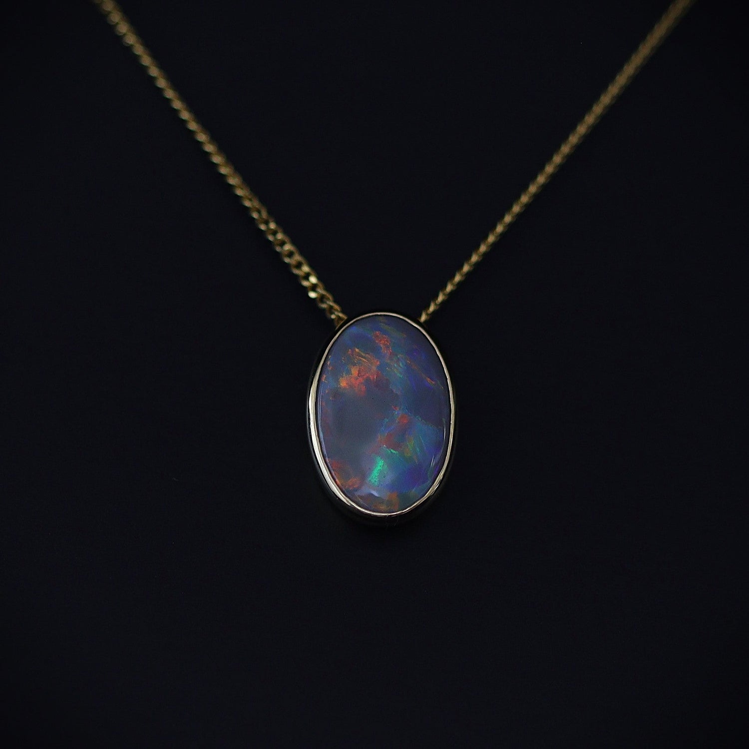 Australian black opal pendant in 18 karat gold