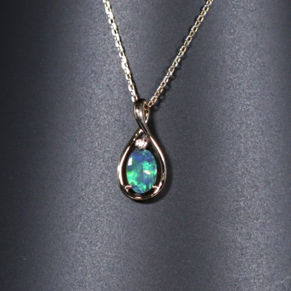 Black solid opal 18K Gold pendant 2016