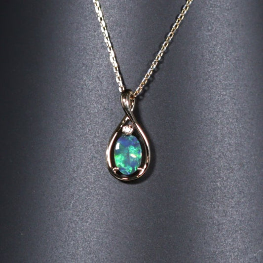 Black solid opal 18K Gold pendant 2016