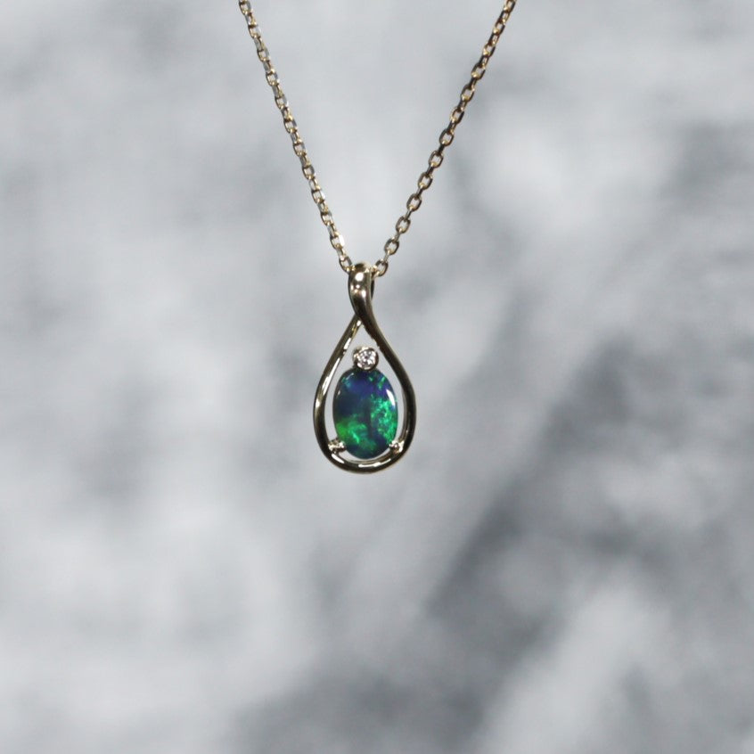 Black solid opal 18K Gold pendant 2016