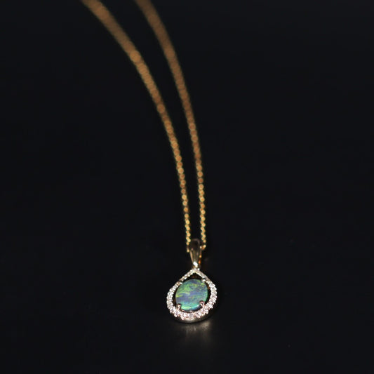 Black Opal 0.81ct 18K Gold with diamonds