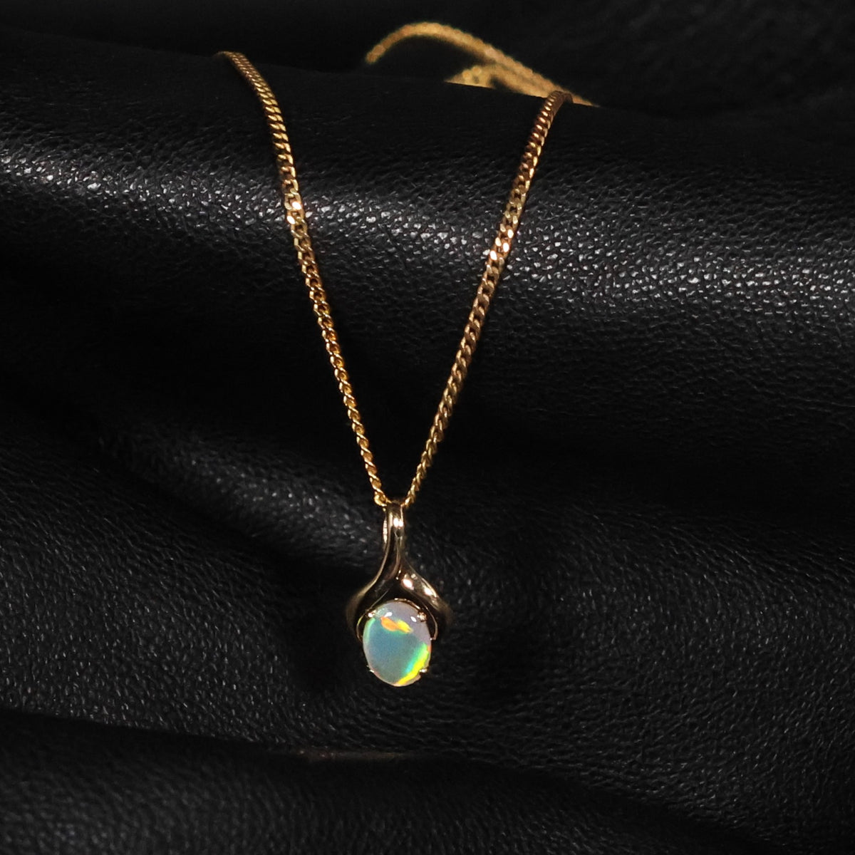 Black Opal solid crystal fire red flash