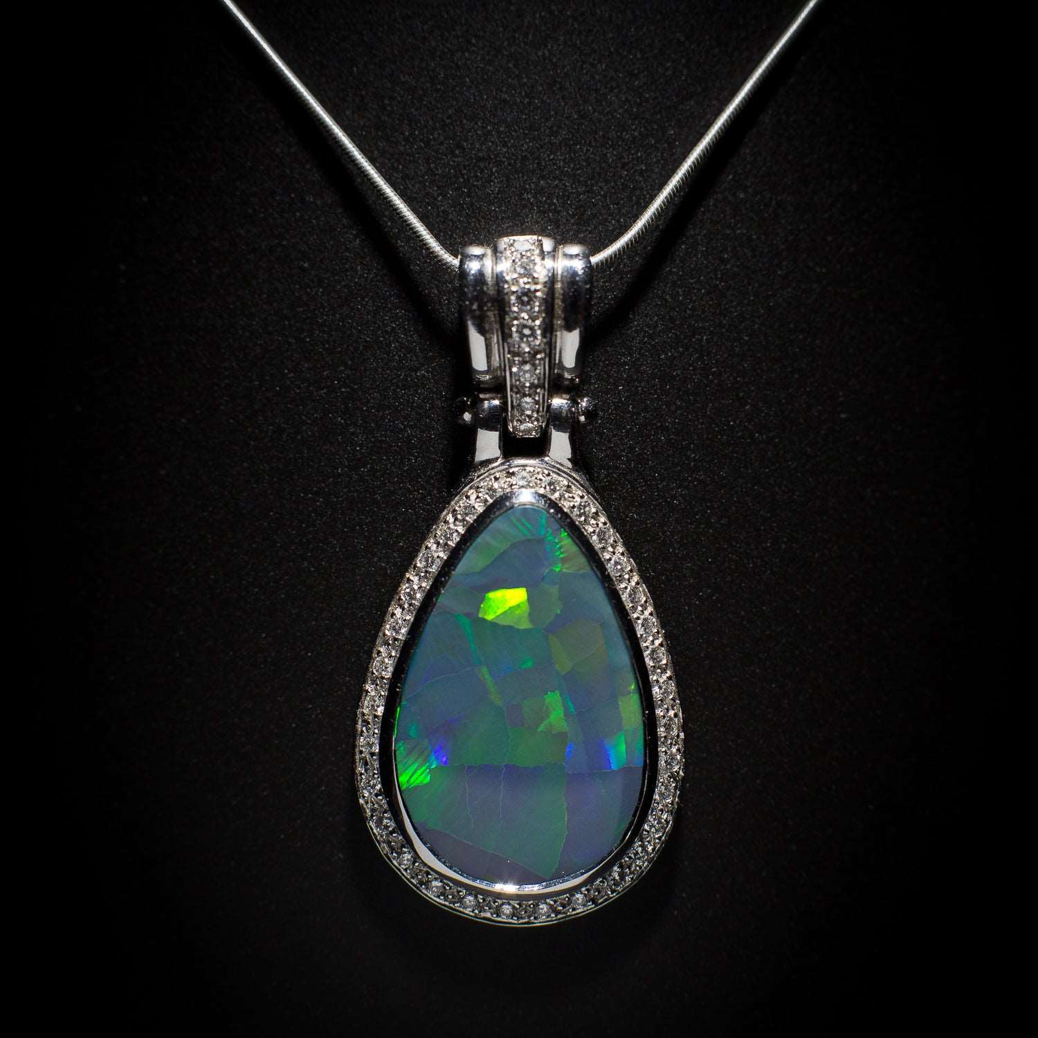 Australian solid Black Opal in 18K WG