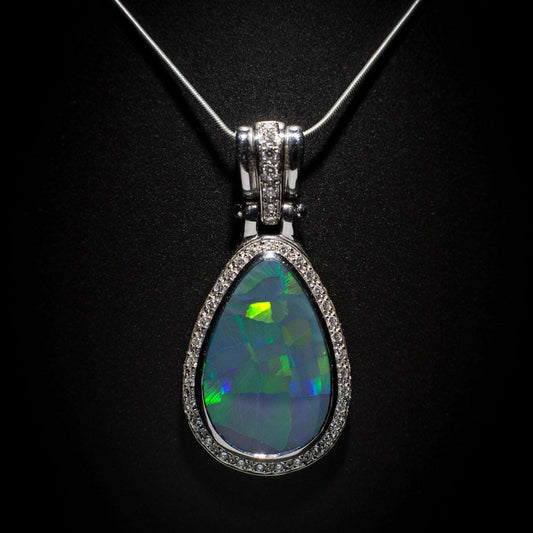 Australian solid Black Opal in 18K WG