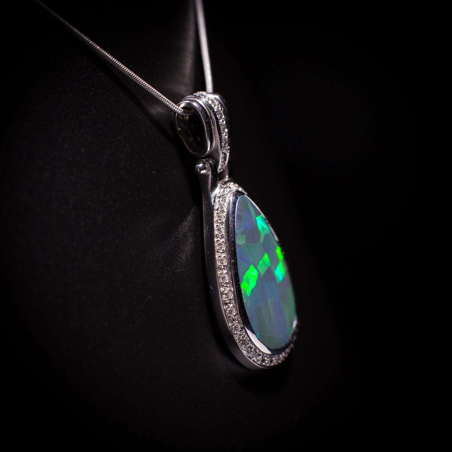 Australian solid Black Opal in 18K WG