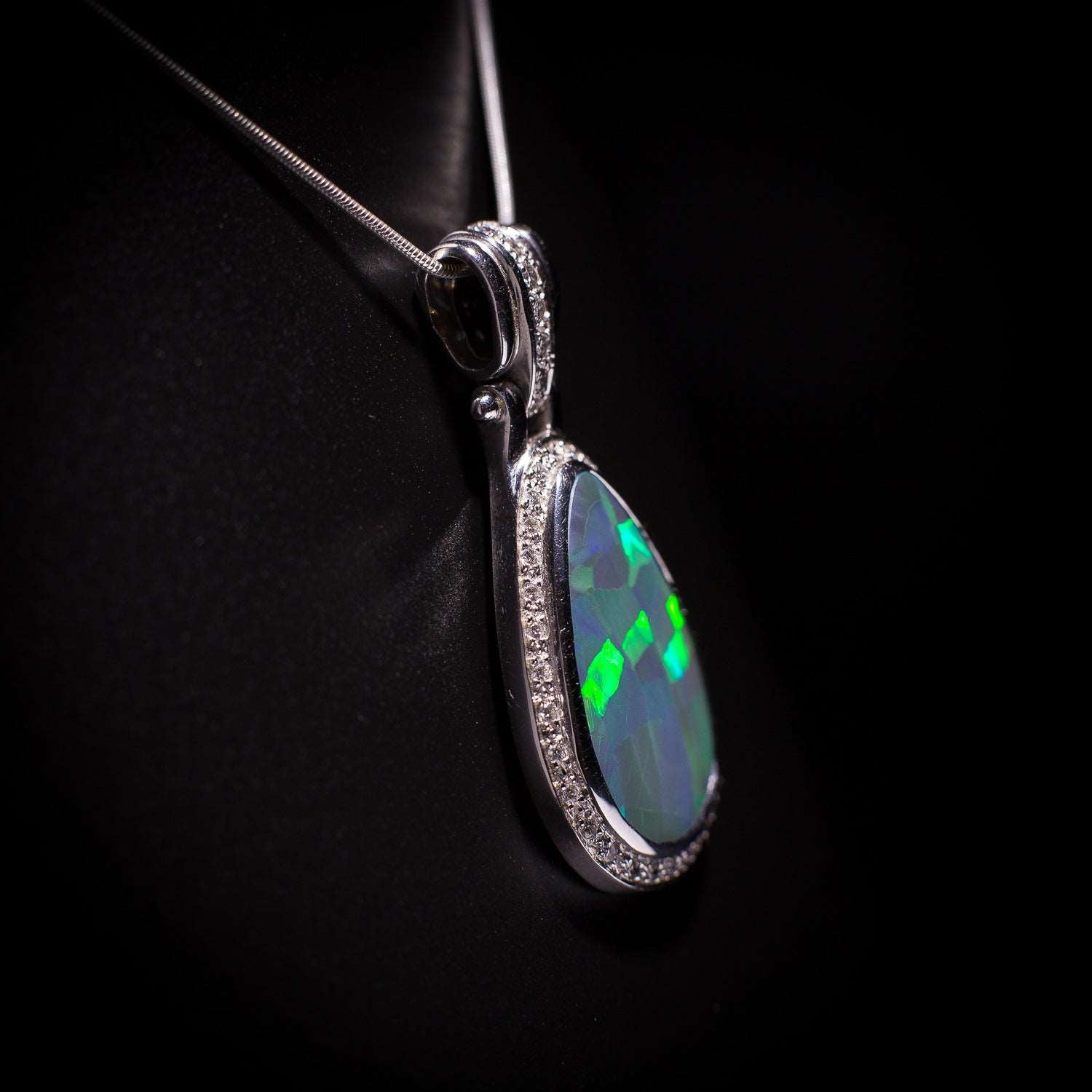 Australian solid Black Opal in 18K WG