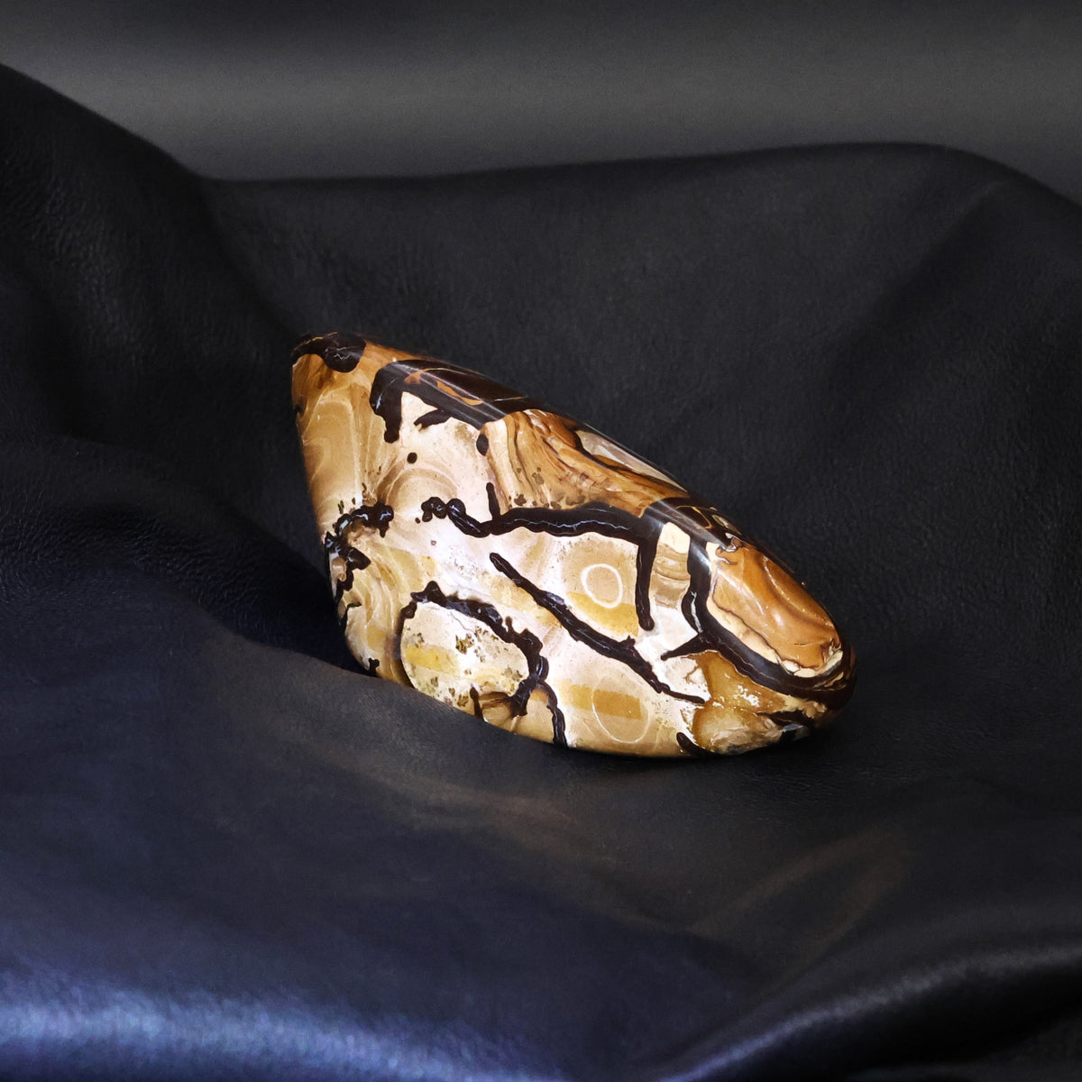 Boulder opal specimen unusual pattern highly polished