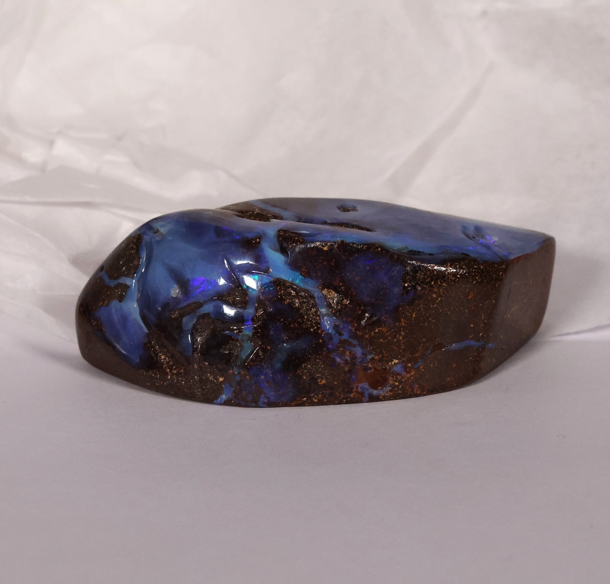 Boulder opal specimen strong blue color 0.10 kg