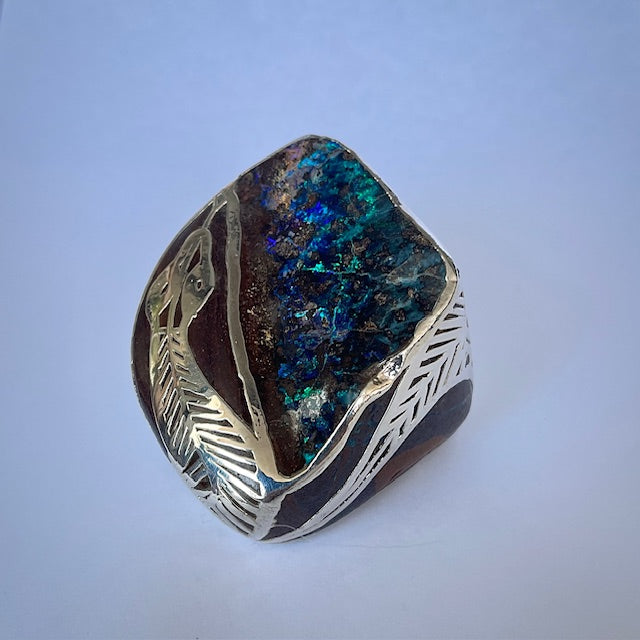 Australian Boulder opal specimen in pure silver art
