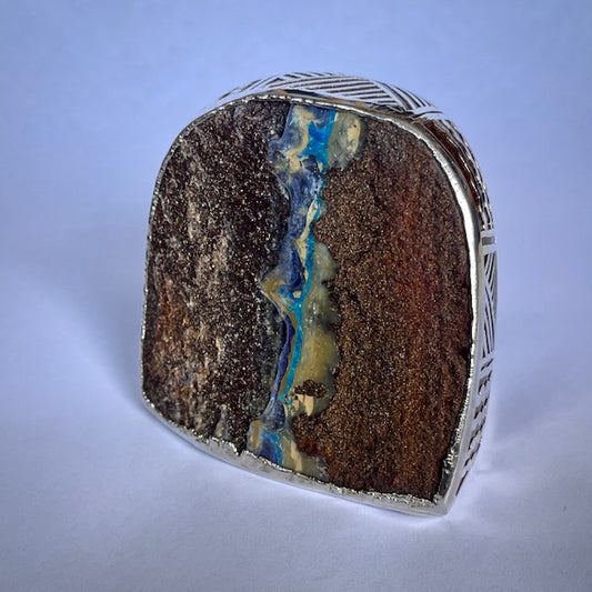 Australian Boulder opal specimen in pure silver art
