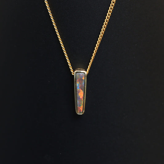 Australian Black solid Opal  in 18 karat gold pendant 