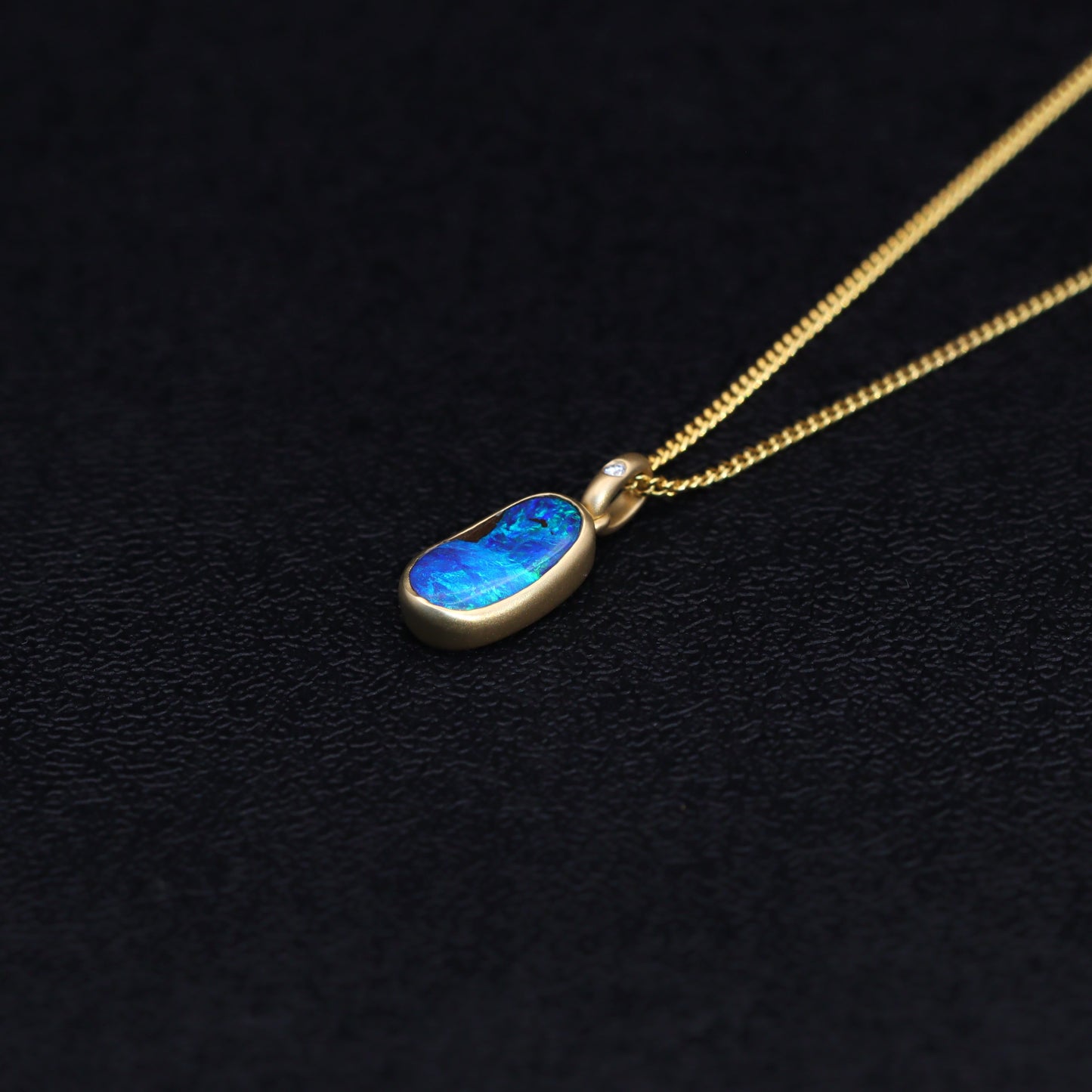 Australian Boulder solid Opal  in 18 karat gold pendant 