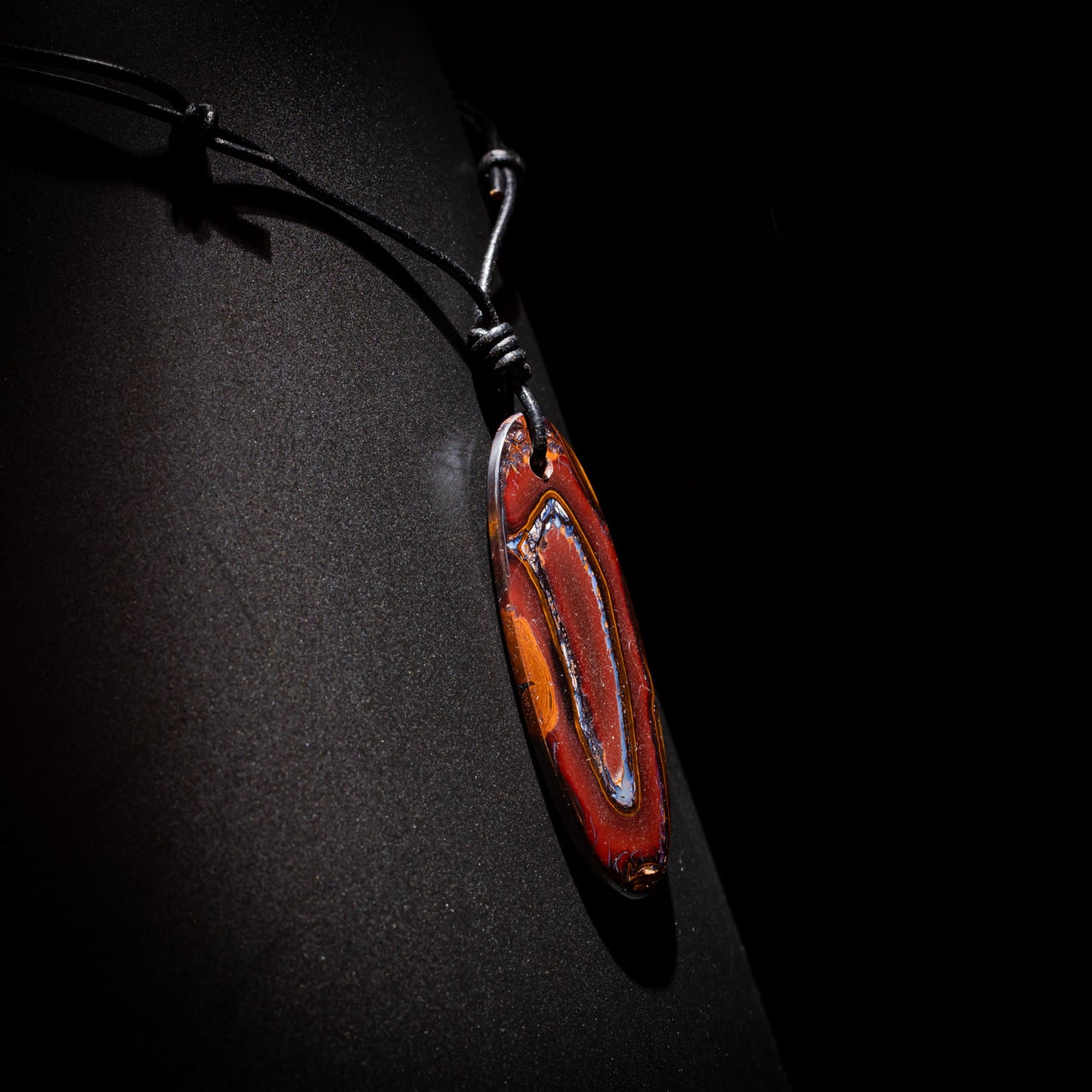 Australian Boulder Opal on leather