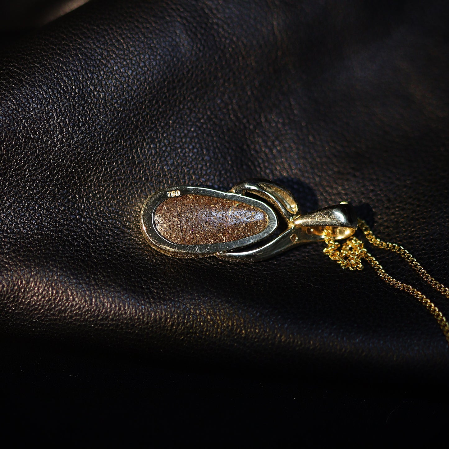 Australian Boulder opal set in 18 K gold pendant