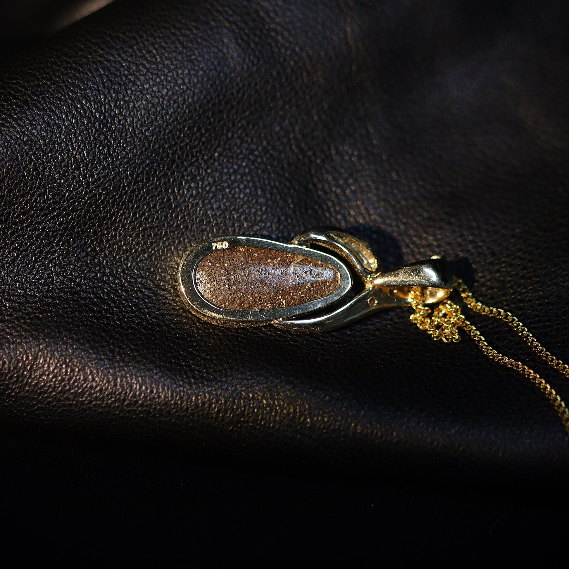 Australian Boulder opal set in 18 K gold pendant