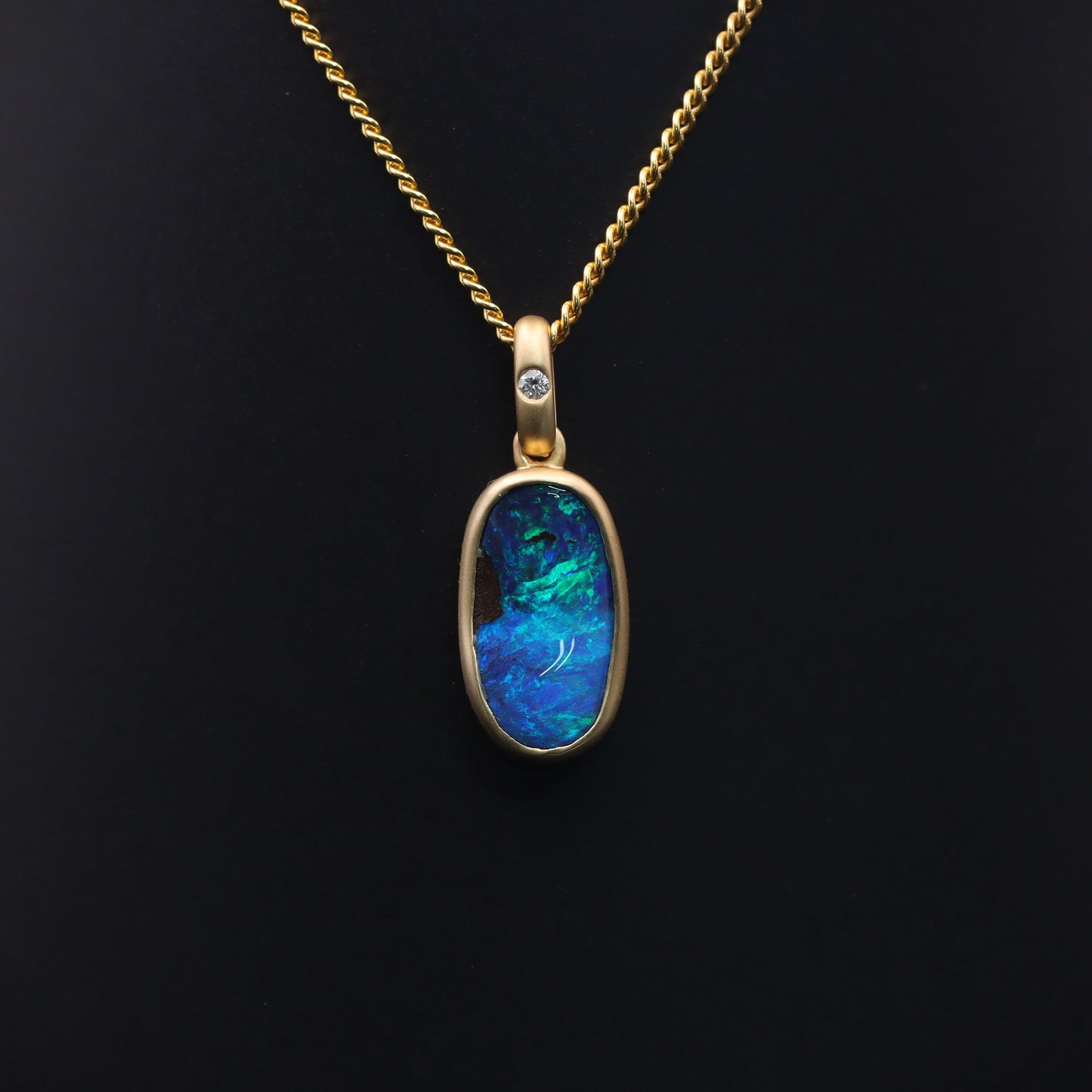 Australian Boulder solid Opal  in 18 karat gold pendant 