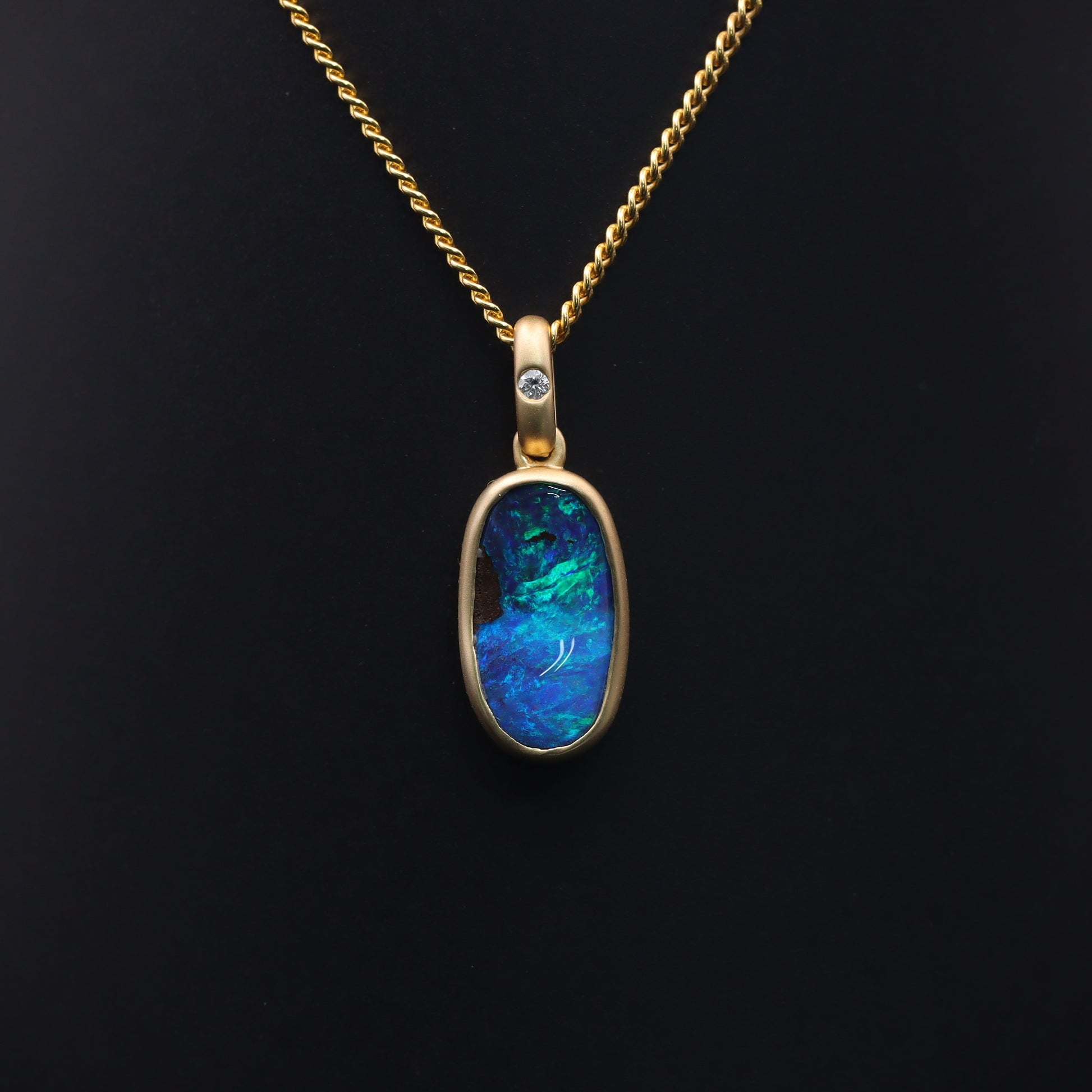 Australian Boulder solid Opal  in 18 karat gold pendant 