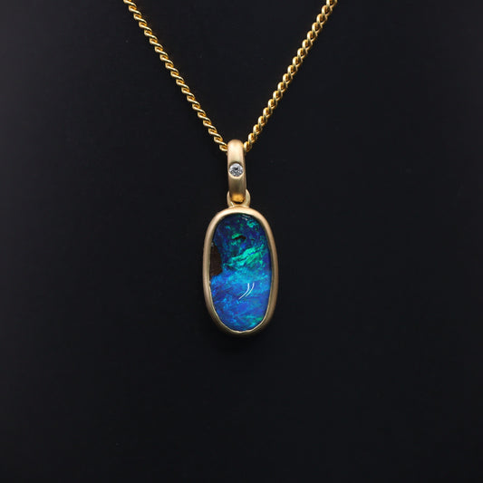 Australian Boulder solid Opal  in 18 karat gold pendant 