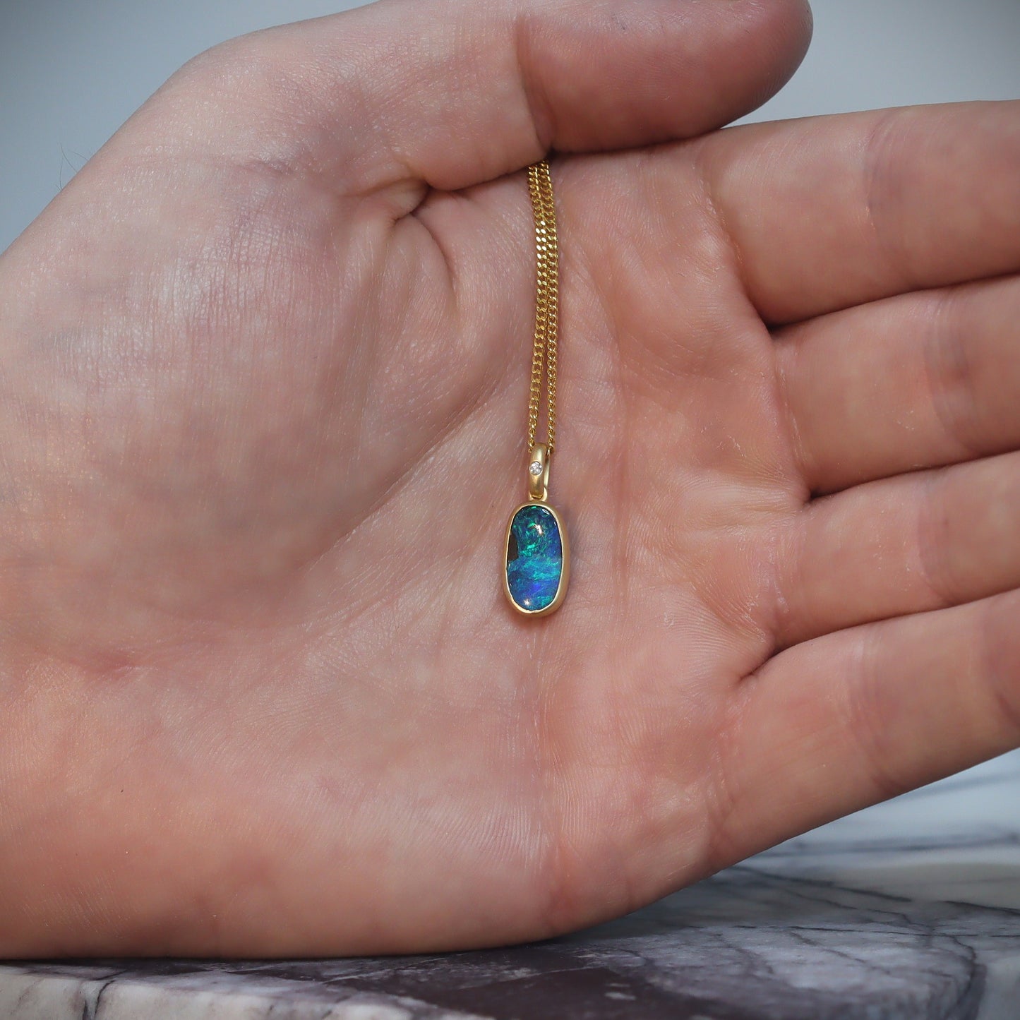 Australian Boulder solid Opal  in 18 karat gold pendant 