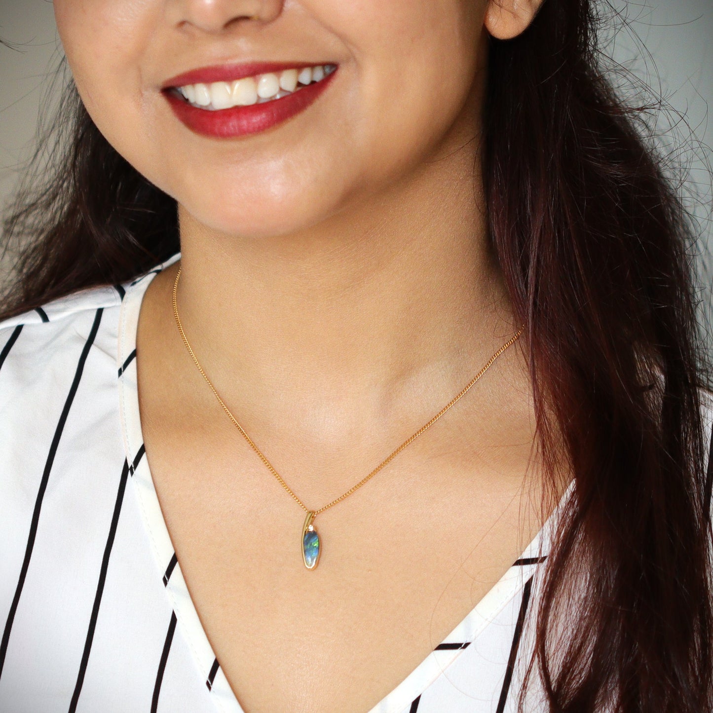 Australian Black opal set in 18 K gold pendant