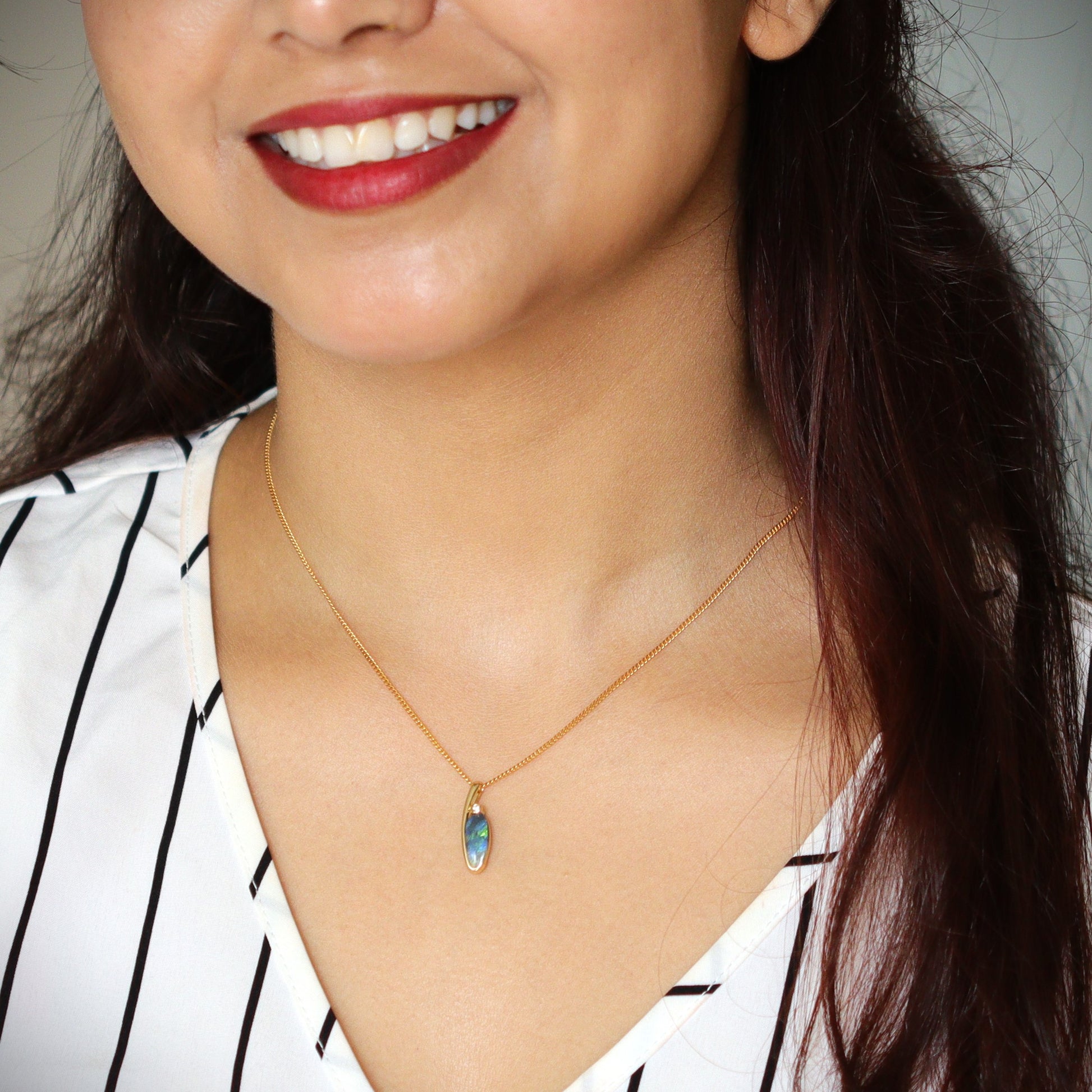 Australian Black opal set in 18 K gold pendant