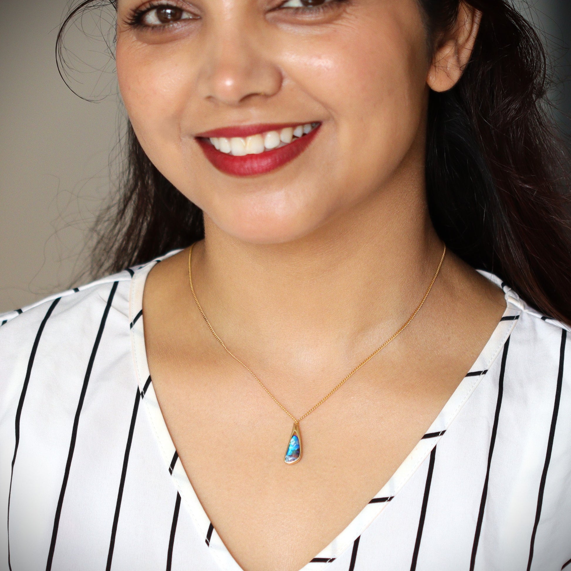 Australian Boulder opal set in 18 K gold pendant