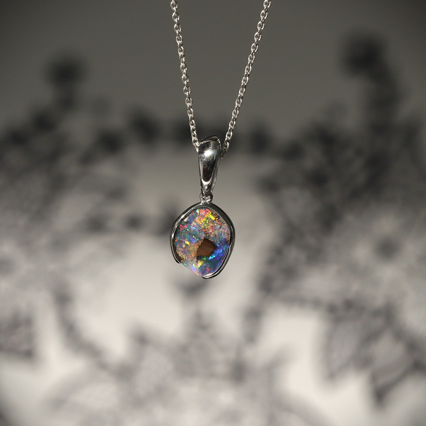 Australian Boulder opal pendant in sterling silver 