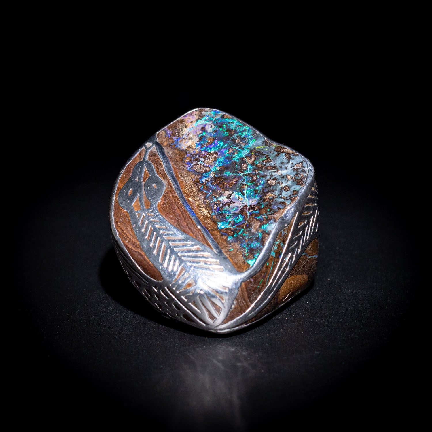 Australian Boulder opal specimen in pure silver art
