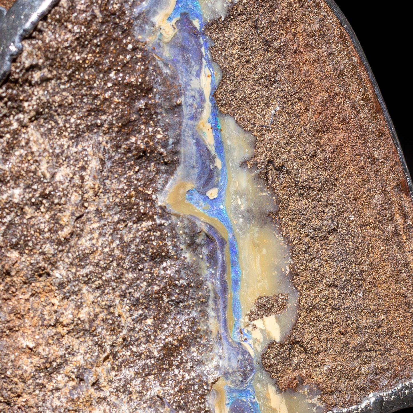 Australian Boulder opal specimen in pure silver art