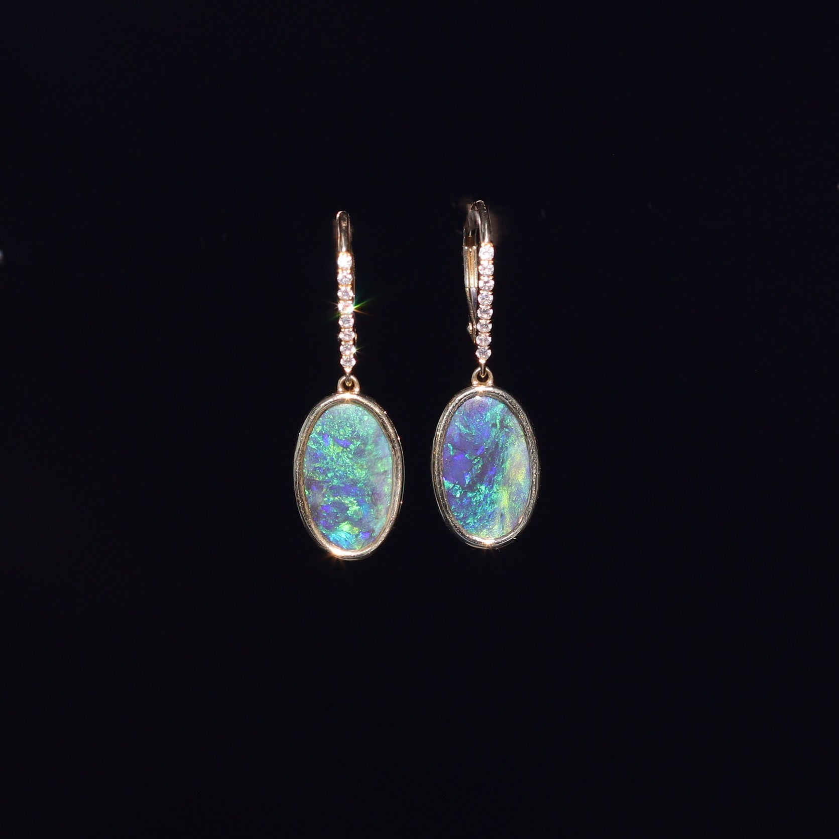 Australian Black Opal 18 karat yellow gold earning 