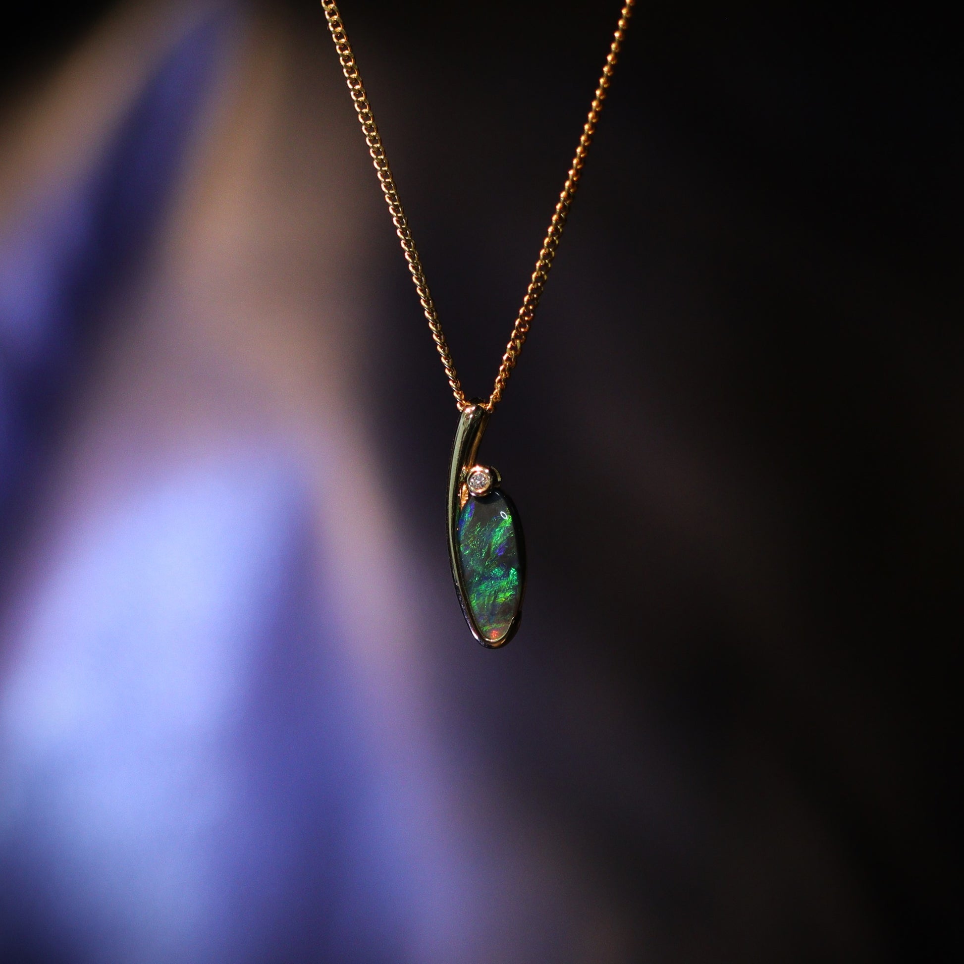 Australian Black opal set in 18 K gold pendant