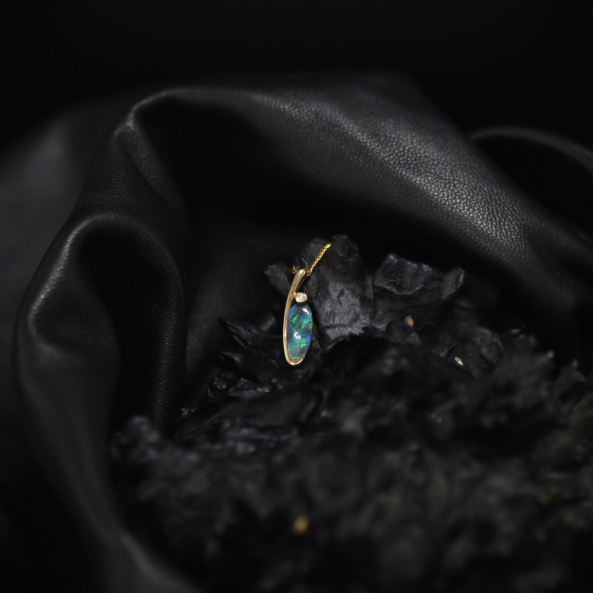 Australian Black opal set in 18 K gold pendant