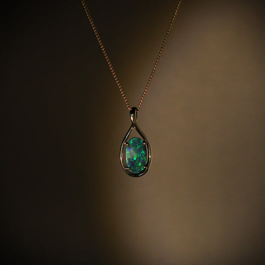 Australian Black opal set in 18 K gold pendant