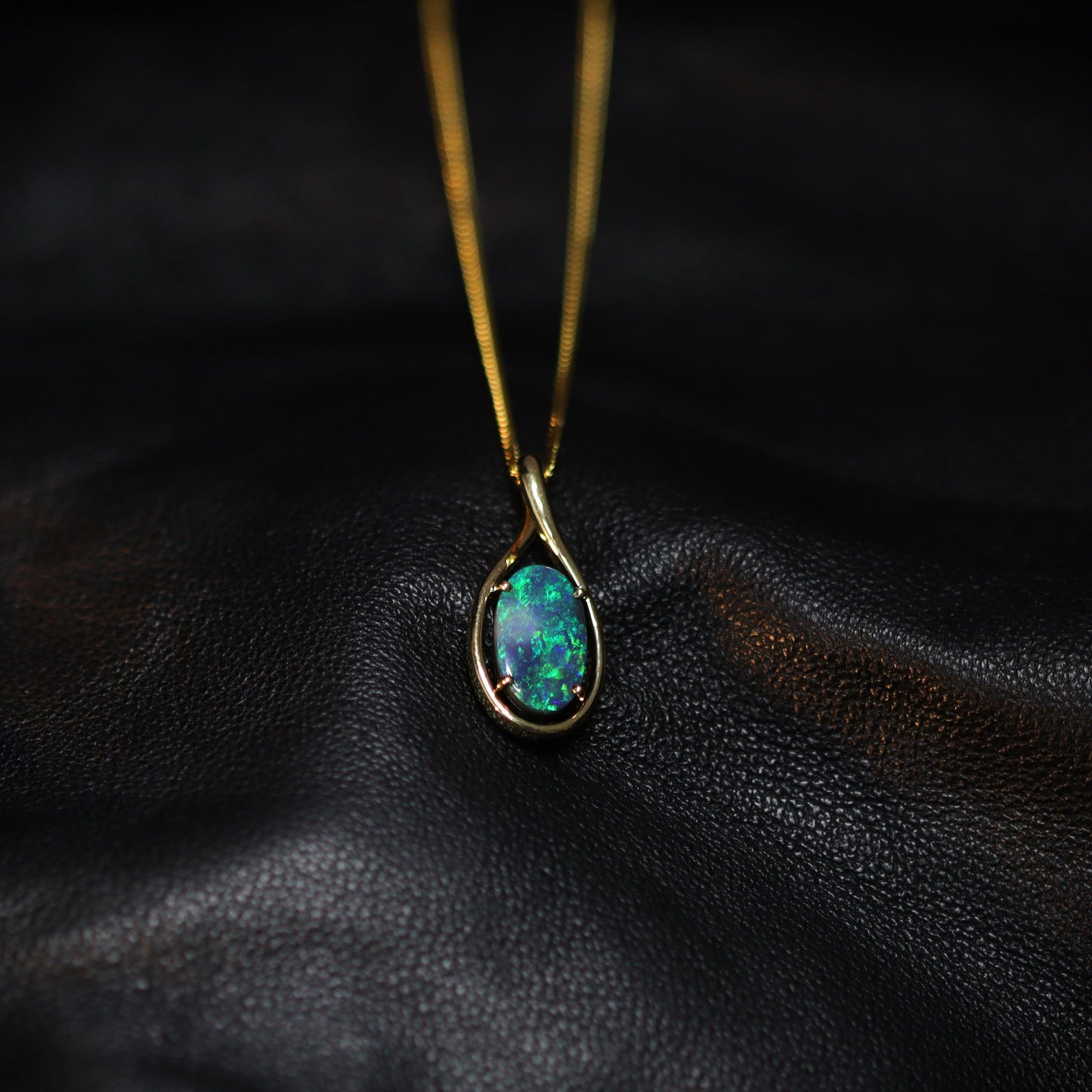 Australian Black opal set in 18 K gold pendant