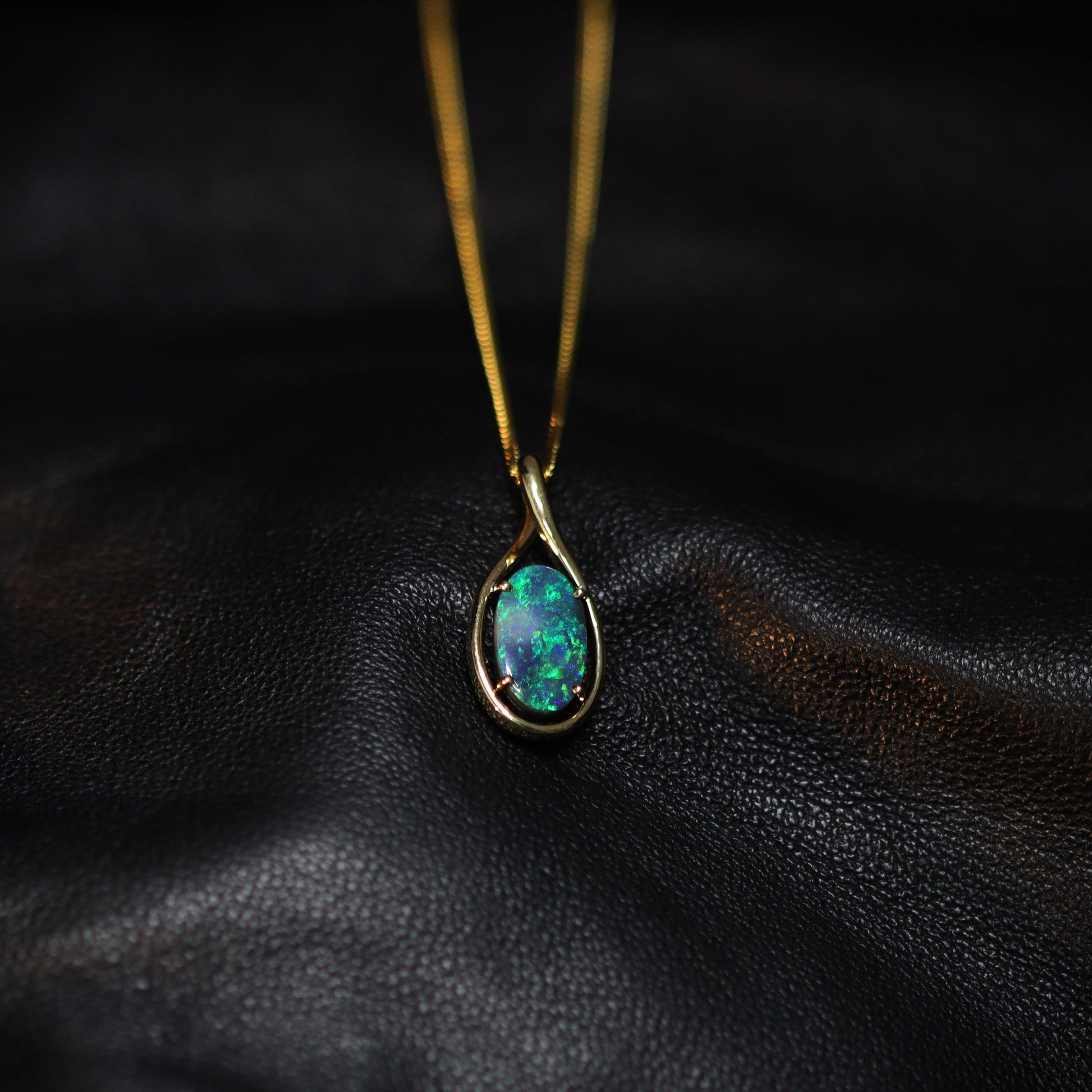 Australian Black opal set in 18 K gold pendant