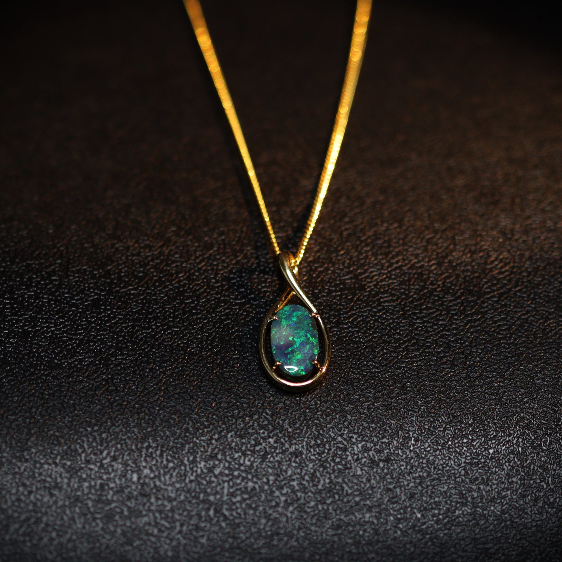 Australian Black opal set in 18 K gold pendant