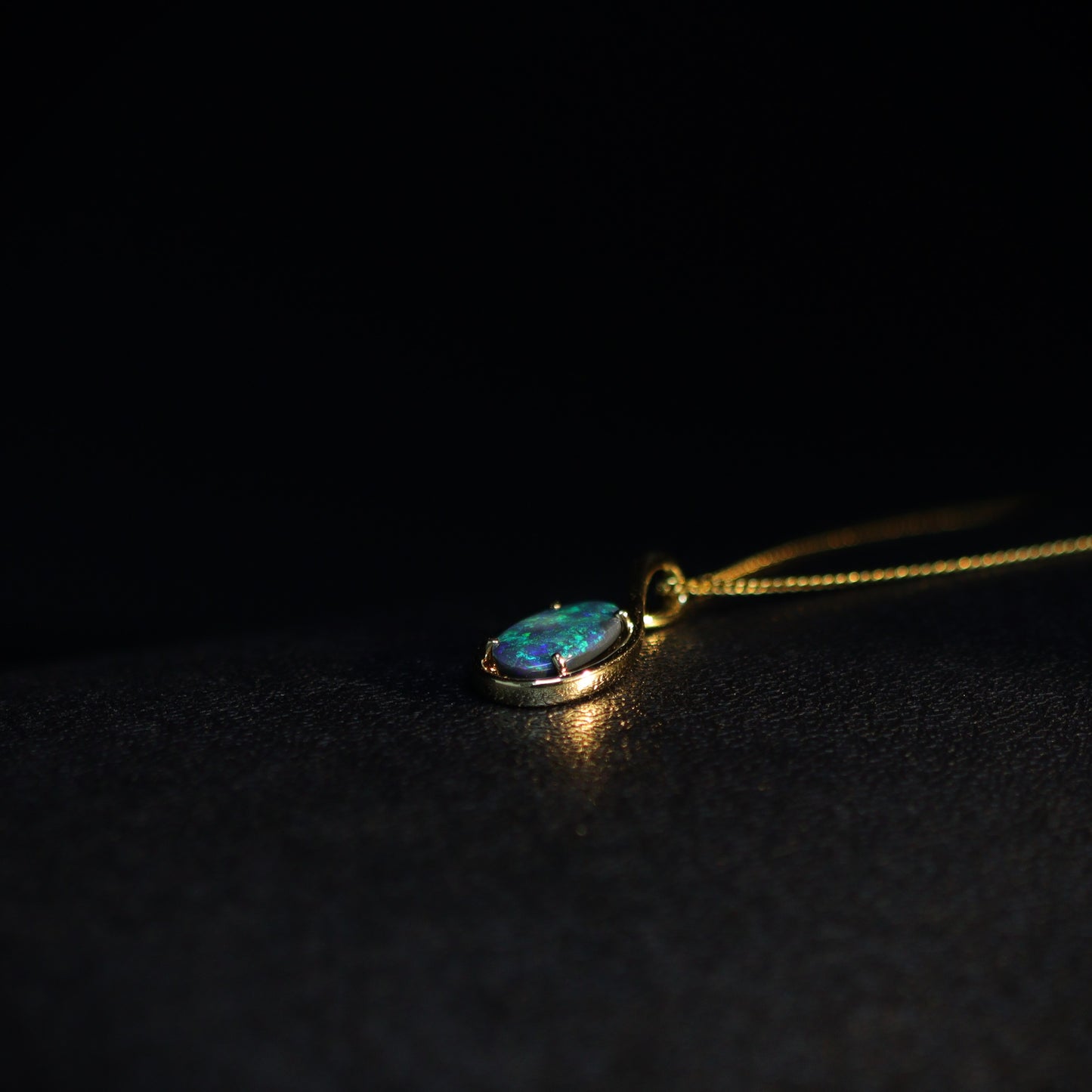 Australian Black opal set in 18 K gold pendant