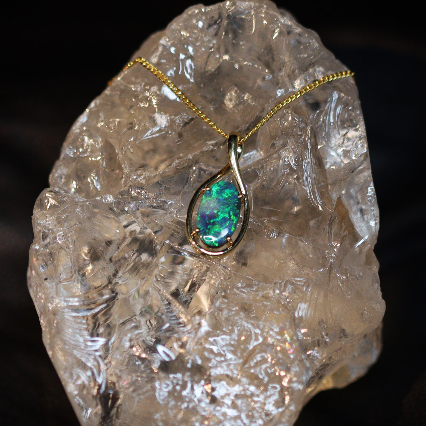 Australian Black opal set in 18 K gold pendant