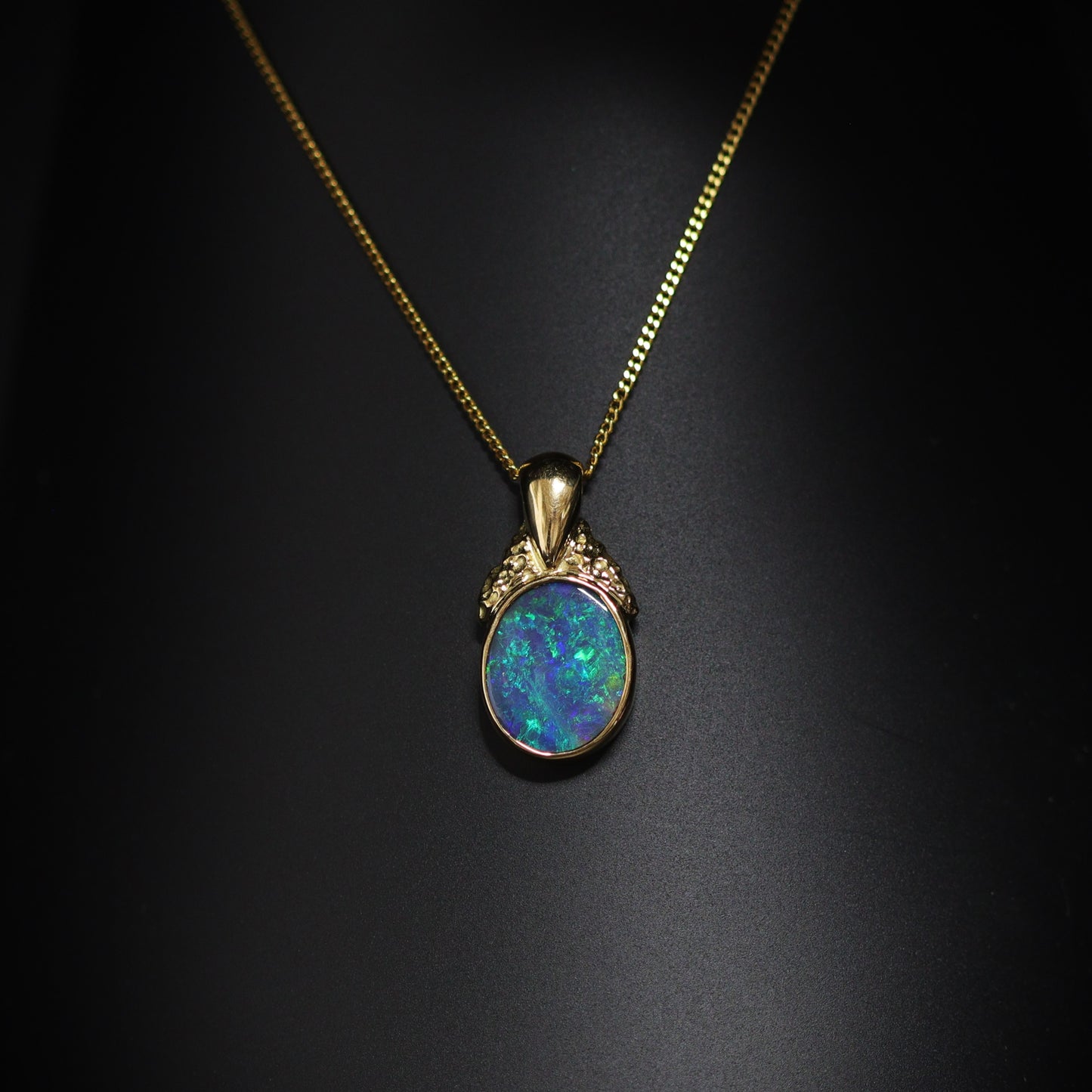 Australian Black Opal 18Kt Gold pendant 