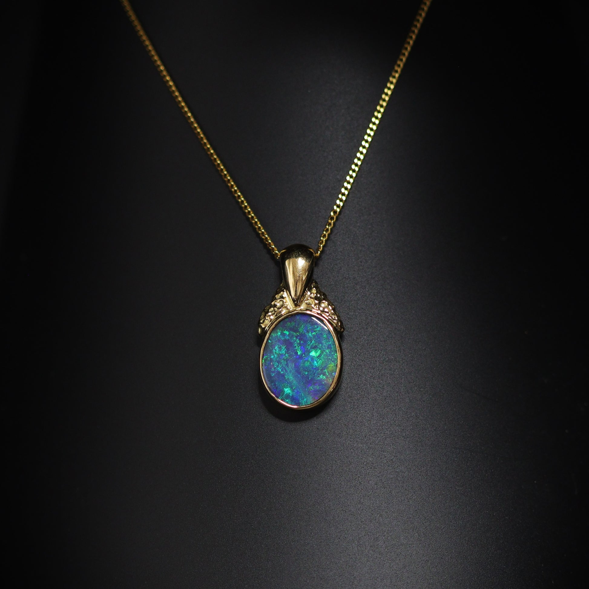 Australian Black Opal 18Kt Gold pendant 