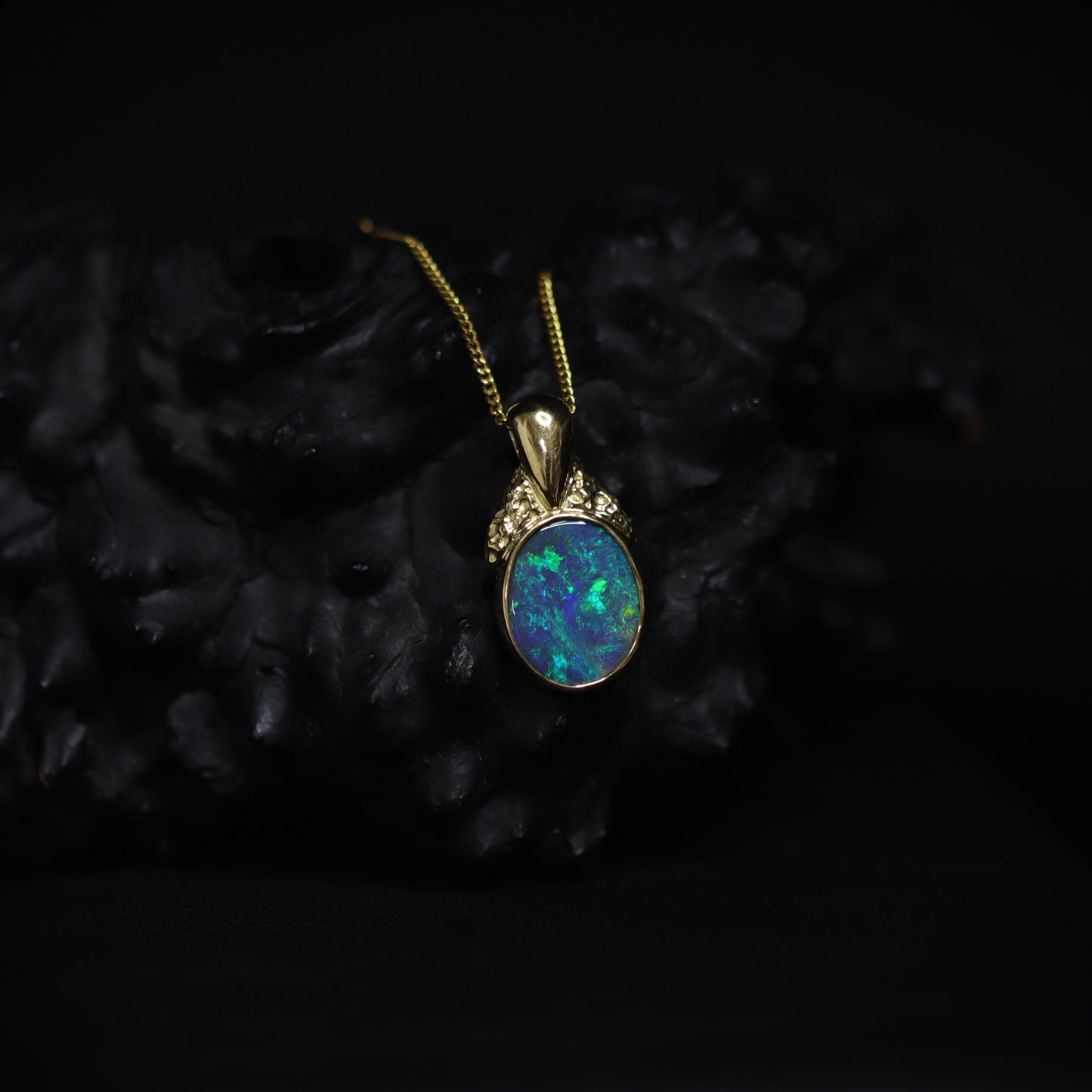 Australian Black Opal 18Kt Gold pendant 