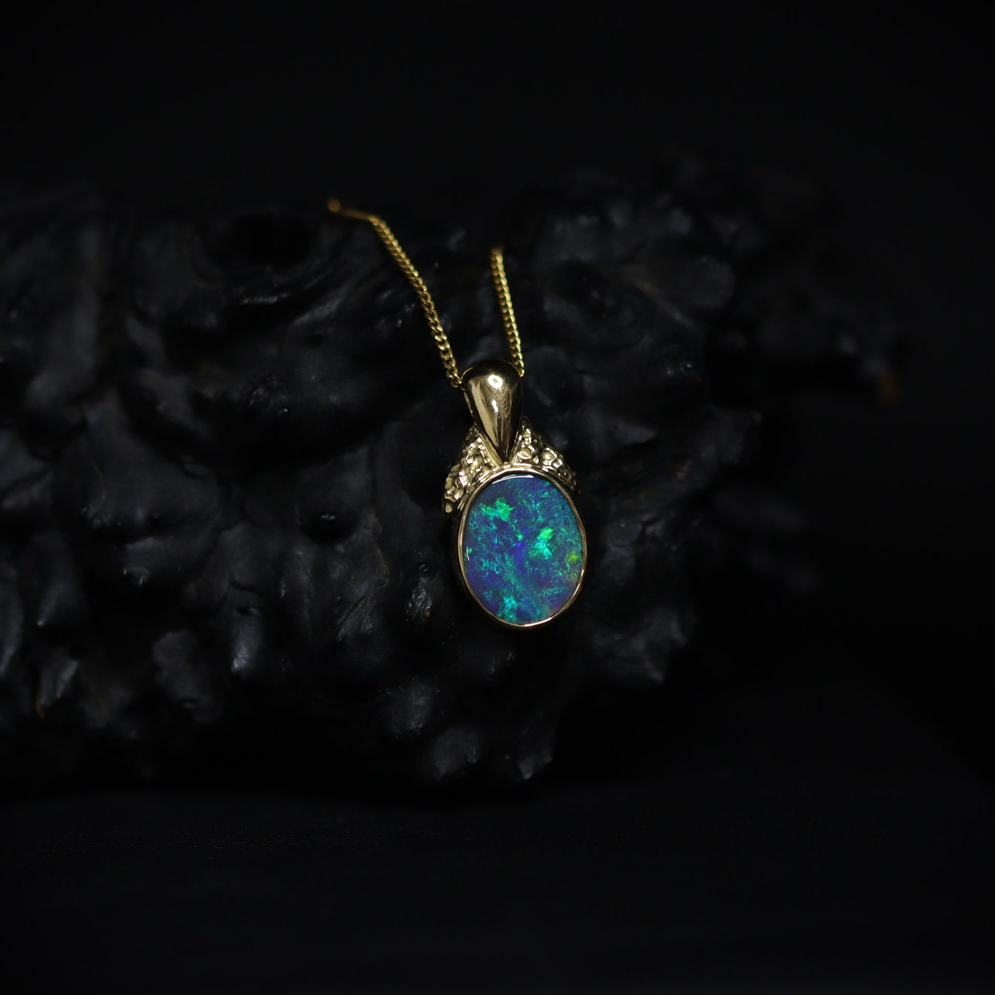 Australian Black Opal 18Kt Gold pendant 