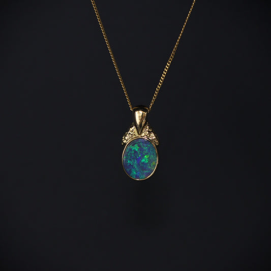 Australian Black Opal 18kt Gold pendant 