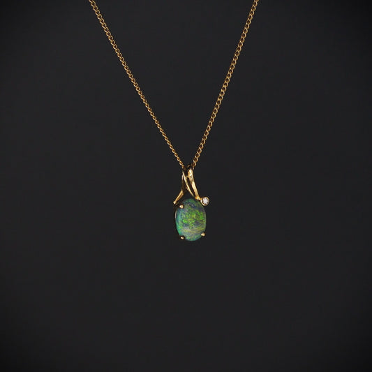 Australian Black Opal 18kt gold pendant 